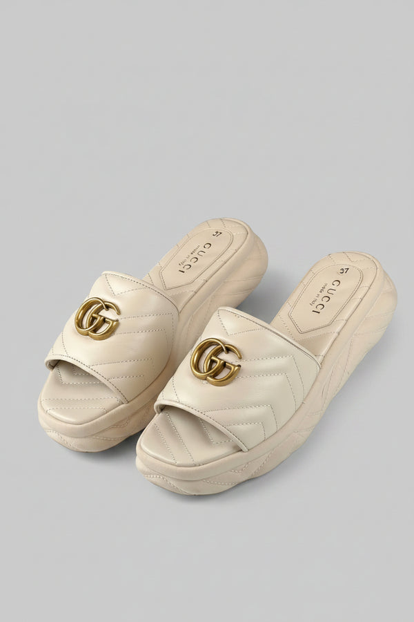 GG Embossed Platform Slide Sandals