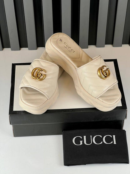 GG Embossed Platform Slide Sandals