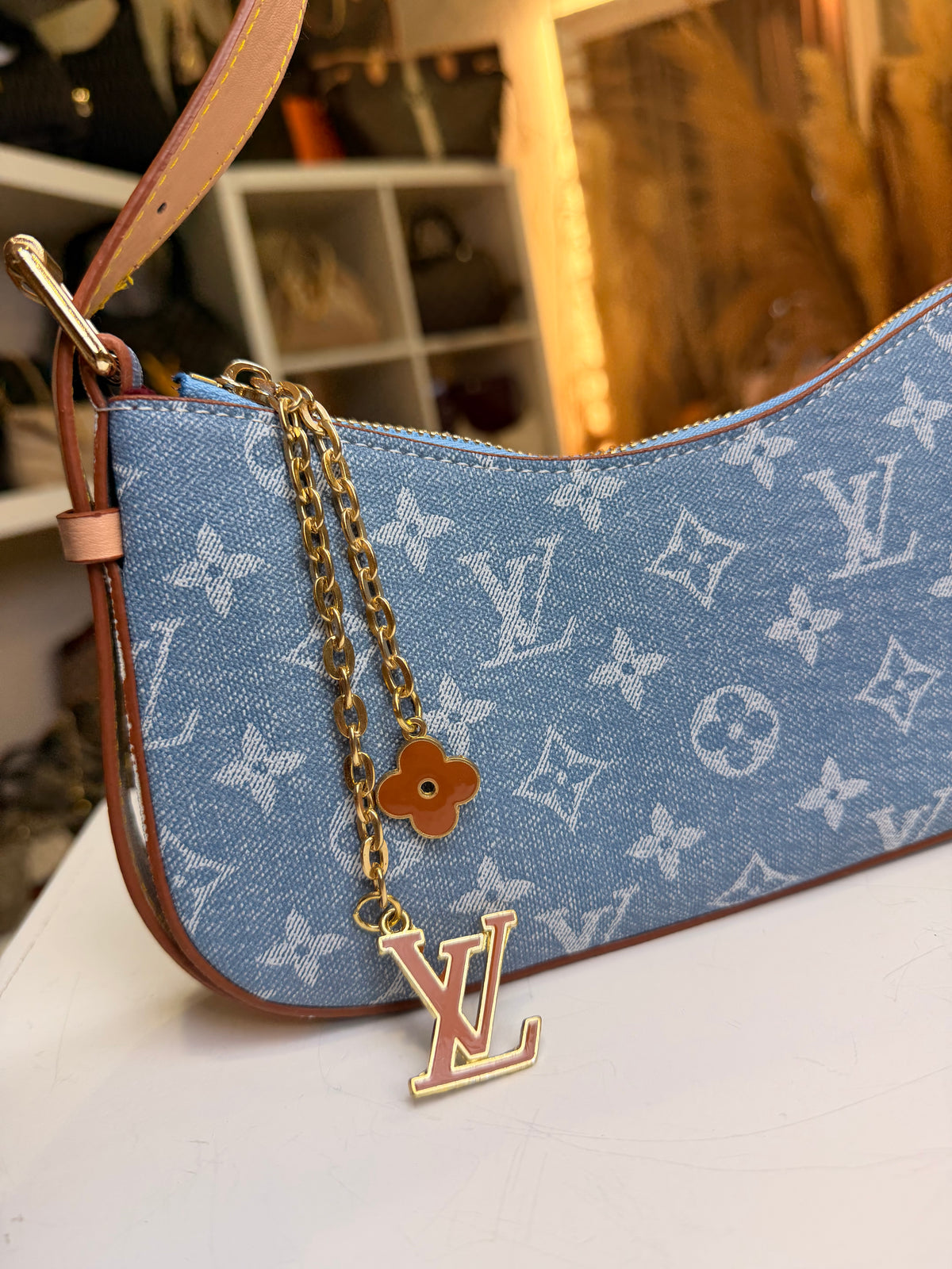 Liv Pochette Monogram Sky Blue Denim